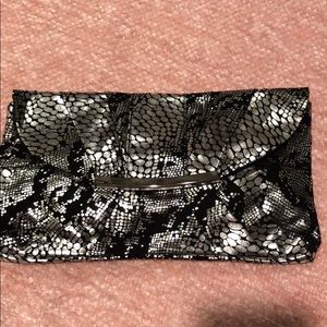 Clutch with unique silver print